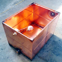 High temperature copper header tank showing metal valve and float